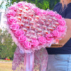 Великий рожевий букет із цукерками Rafaello на день закоханих