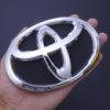 Емблема «Toyota» 150х100мм /6 пуклі (Camry 2007-2009 /HYBRID перед) (Польща) OEM75311-06060