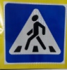 Наклейка на дорожній знак «Пішохідний перехід»