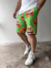Зелені чоловічі легкі літні трикотажні шорти з яскравим принтом смайликів