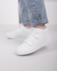 Жіночі білі кросівки з еко-шкіри