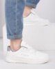 Чоловічі білі кросівки із сірим задником