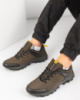Чоловічі чорно-коричневі кросівки на шнурівці