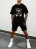 Чоловічий чорний трендовий спортивний літній костюм з яскравим дизайном