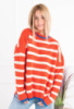 Жіночий помаранчевий светр у смужку