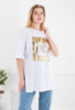 Жіноча біла туніка з принтом