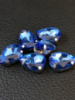 Страз (стекло)  в металлической оправе. Размер - 10×14 мм. Цвет - синий светлее