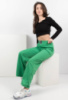 Жіночі зелені спортивні брюки