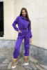 Жіночий фіолетовий комбінезон
