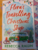 Flora's Travelling Christmas Shop by Rebecca Raisin