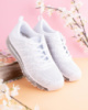 Жіночі білі кросівки з текстилю