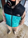 Жилет The North Face  черный верх бирюзовый низ 50-7.426