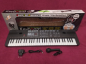 Детский орган синтезатор пианино MQ 012 FM Радио, 61 клавиша Работает от сети и батареек
