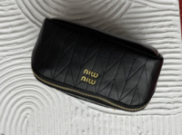 Жіноча косметичка  Miu Miu чорний золото