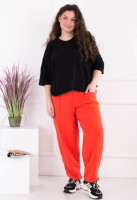 Жіночі помаранчеві спортивні брюки-банани батал