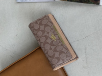 Жіночий гаманець Coach великий подвійний бежевий