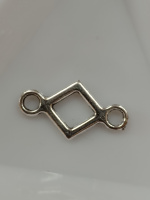 Коннектор. Размер - 2×1,2 см. Цвет - серебро. Цена за 1 шт.