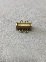 Замок магнитный. Размер - 6*15 мм. На 2 линии. Цвет - бронза