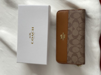 Гаманець Coach Signature Accordion Zip Wallet бежевий