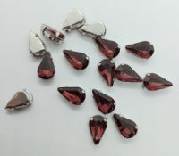 Страз (стекло)  в металлической оправе. Размер - 8×13 мм. Цвет - баклажановый