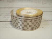 Стрічка атласна з малюнком Гуччі.Колір: молочний. Розмір: 2,5 см