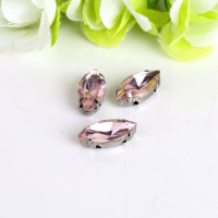 Страз (стекло)  в металлической оправе. Размер - 7×15 мм. Цвет- розовый