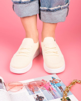 Жіночі жовті кросівки з текстилю.