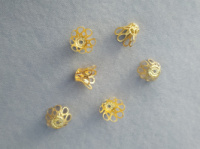 Обіймач дзвіночок.
Розмір - 1,3 см.
Колір золото. Ціна за 10 шт