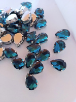 Страз (стекло)  в металлической оправе. Размер - 10×14 мм. Цвет - бирюза