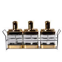 Набір банок для сипучих продуктів 3 штуки з ложкою на підставці, золото