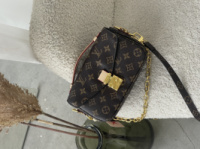 Сумка Louis Vuitton Pochette Metis East West Monogram коричневий