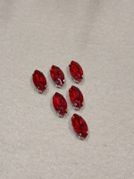 Страз (стекло)  в металлической оправе. Размер - 6×12 мм. Цвет - красный