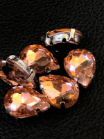 Страз (стекло)  в металлической оправе. Размер - 10×14 мм. Цвет - персиковый