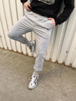 Чоловічі штани Nike трикотаж світло-сірі
