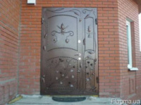 Двери входные металлические с ковкой