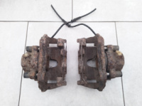 Передний тормозной суппорт Мерседес-Бенц W210 2.3