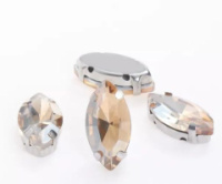 Страз (стекло)  в металлической оправе. Размер - 6×12 мм. Цвет - шампанское