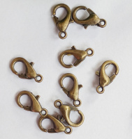Замок -лобстер. Размер - 10 мм. Цвет - бронза. Цена указана за 5 шт.
