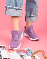 Жіночі фіолетові кросівки з текстилю.