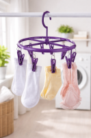 Вертушка з прищіпками для сушіння білизни
