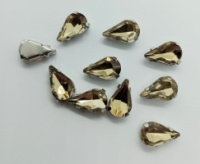 Страз (стекло)  в металлической оправе. Размер - 8×13 мм. Цвет - раухтопазовый