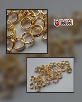 Соединительные колечки «двойные» . Размер - 5 мм. Упаковка - 5 грамм(прим.61 шт). Цвет лимонное золото