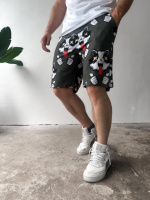 Чоловічі темно-зелені зручні літні трикотажні шорти з яскравим дизайном